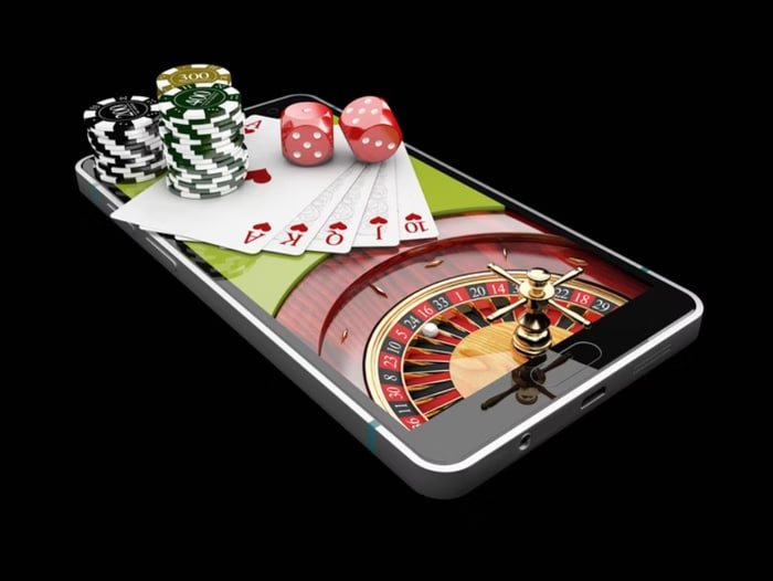 Giao diện ứng dụng mobile xdmt hiển thị sportsbook và casino trên điện thoại